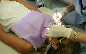 woman undergoing dental treatment