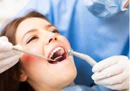 Woman undergoing dental treatment 